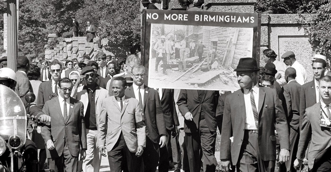 Congress of Racial Equality and members of the All Souls Church, Unitarian located in Washington, D.C. march in memory of the 16th Street Baptist Church bombing victims. The banner, which says “No more Birminghams”, shows a picture of the aftermath of the bombing. (Photo: US News & World Report Collection, US Library of Congress / Wikimedia Commons)