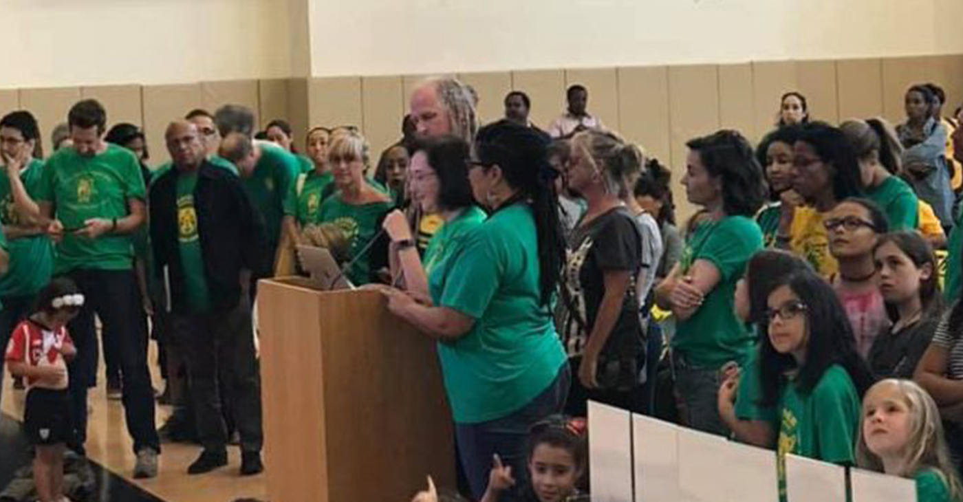 Teachers, students and parents speak at standing-room only Oakland Board of Education meeting, Wednesday, Sept. 11. (Photo courtesy of Chastity Garcia, Facebook.)