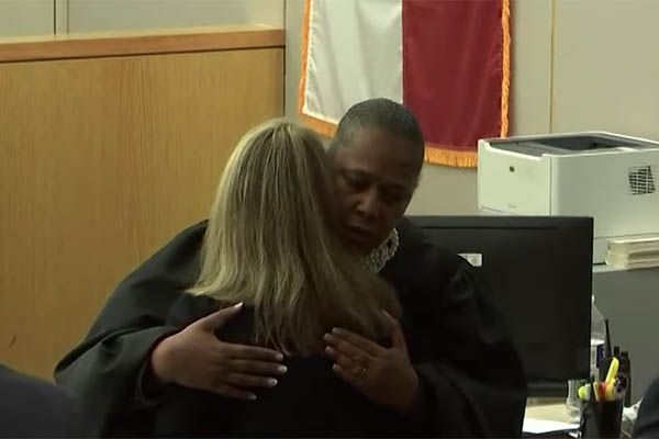Judge Tammy Kemp hugging Amber Guyger
