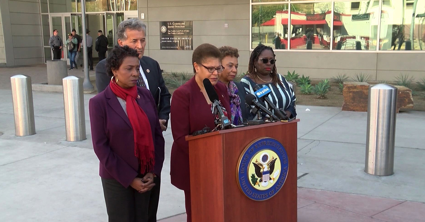 Members of the Congressional Black Caucus, Rep. Karen Bass (D-CA) (center), Rep. Barbara Lee (D-CA) (fourth from left), and Congresswoman Yvette Clarke (D-NY) (far left), along with local Congressman, Rep. Juan Vargas (second from left), visited a shelter for African asylum-seekers in Tijuana November 22, 2019. Attorney Nana Gyamfi, the executive director of the Black Alliance for Just Immigration (far right), joined the group at the border. (Photo: Screen capture KPBS / YouTube)