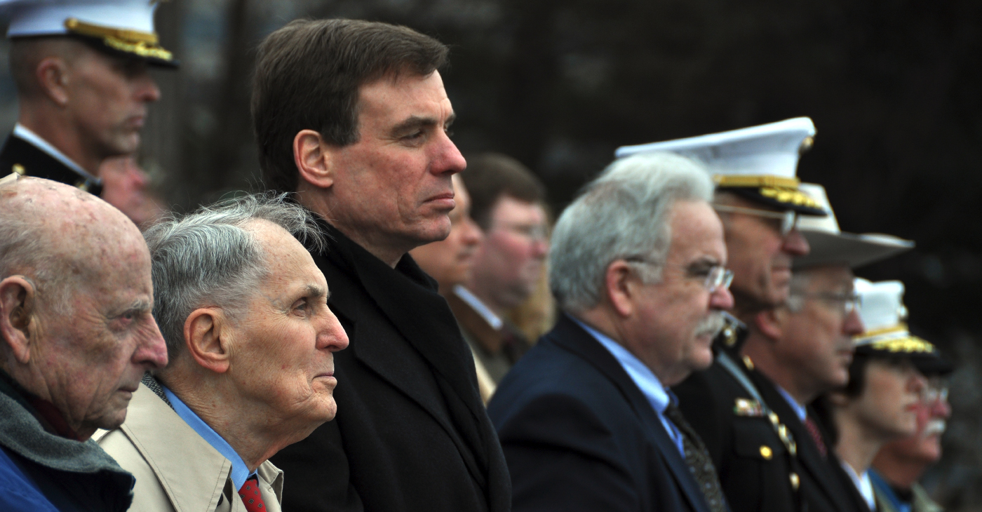 Sen. Mark Warner of Va. (3rd from L) joined World War II veterans at the U.S. Marine Corps Memorial in Arlington, Va., on Tues., Feb. 23, 2010, to commemorate the 65th anniversary of the raising of the U.S. flag at Iwo Jima. The Senator's father, Robert Warner of Vernon, CT, (2nd from L) and James L. Wheeler of Falls Church, VA (far L) are both retired Marines who fought at Iwo Jima. (Photo by Riki Parikh/Sen. Warner’s Office)