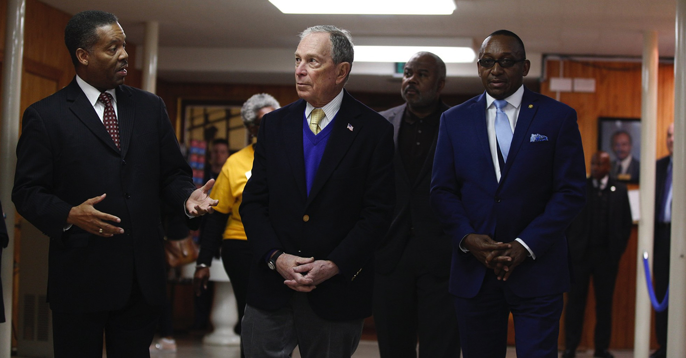 Mike Bloomberg visits the Dexter Avenue King Memorial Baptist Church in Alabama. Originally founded in the holding pen of a slave trader, the church was eventually led by one of our greatest Americans, Dr. Martin Luther King, Jr. (Pictured left to right: Rev. Cromwell Handy, Mike Bloomberg, ASU President Quinton Ross and Bloomberg Campaign co-chair, Bobby Singleton / Source: Facebook.com/mikebloomberg)