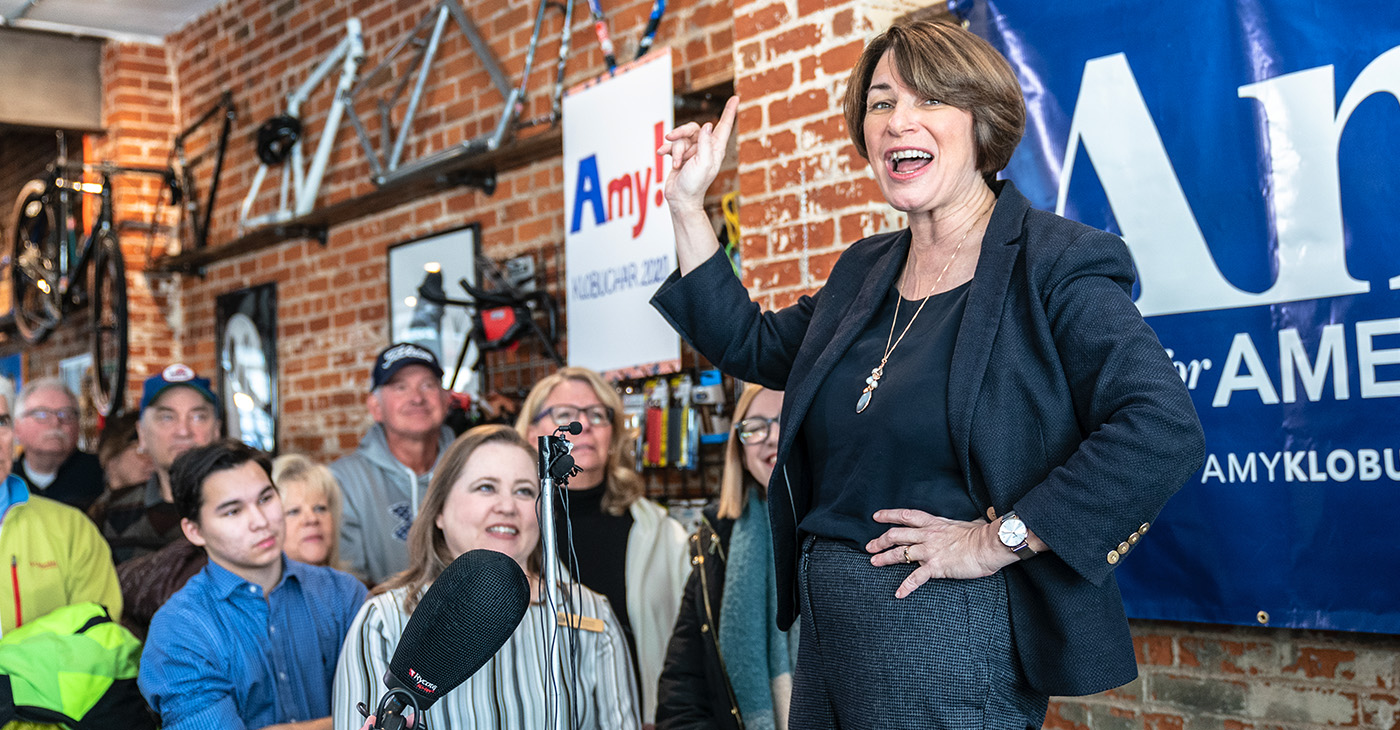 Sen. Amy Klobuchar (D-MN) has avoided media interviews with black news organizations throughout her campaign. (Photo: Senator Amy Klobuchar talks with supporters at Shift Cyclery and Coffee Bar in Eau Claire, Wisconsin / Lorie Shaull / Wikimedia Commons)