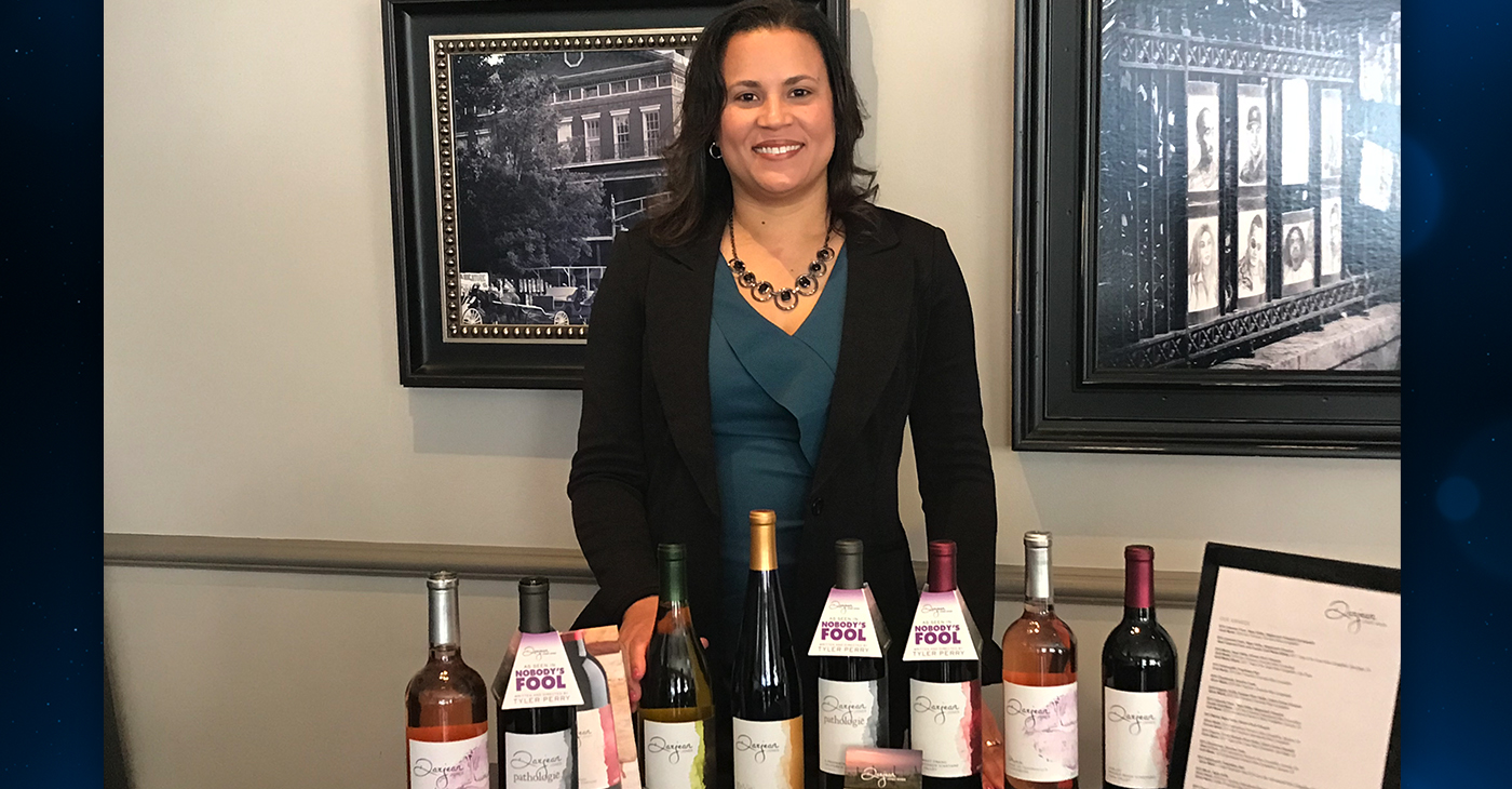 Dawna Jones, vintner and plant scientist, poses with her Darjean Jones Wines which were featured in Tyler Perry's 