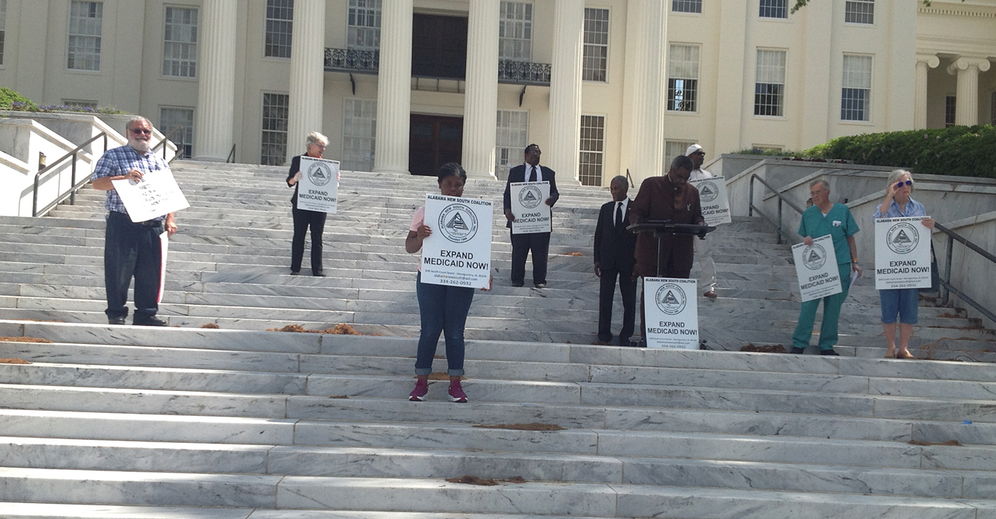 Leaders in the SaveOurSelves Movement for Justice and Democracy, are here on the steps of the Alabama Capitol standing up six feet apart so Alabamians will not have to be lying six feet under.