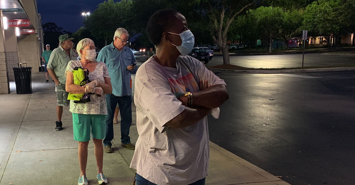 Senior citizens use social distancing while lined up for the early opening of a supermarket on for seniors only. The US government has called for social distancing to slow the spread of the Covid 19 virus. This is at a Publix supermarket in Cocoa, Florida, which opened at 7:00 am for seniors 65 and over. Some are wearing surgical masks. (Photo: iStockphoto / NNPA)