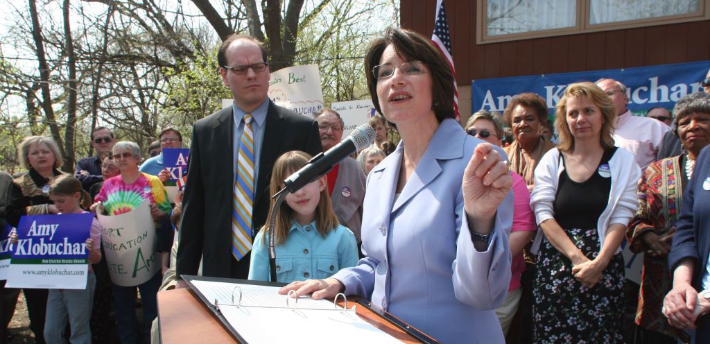 GENERAL INFORMATION: Duane Braley/Star Tribune--Plymouth, Mn., Sun., Apr. 17, 2005--Speaking from the driveway of the home where she grew up, Amy Klobuchar announces her run for the U.S. Senate. Accompaning her were her husband John Bessler and their daug