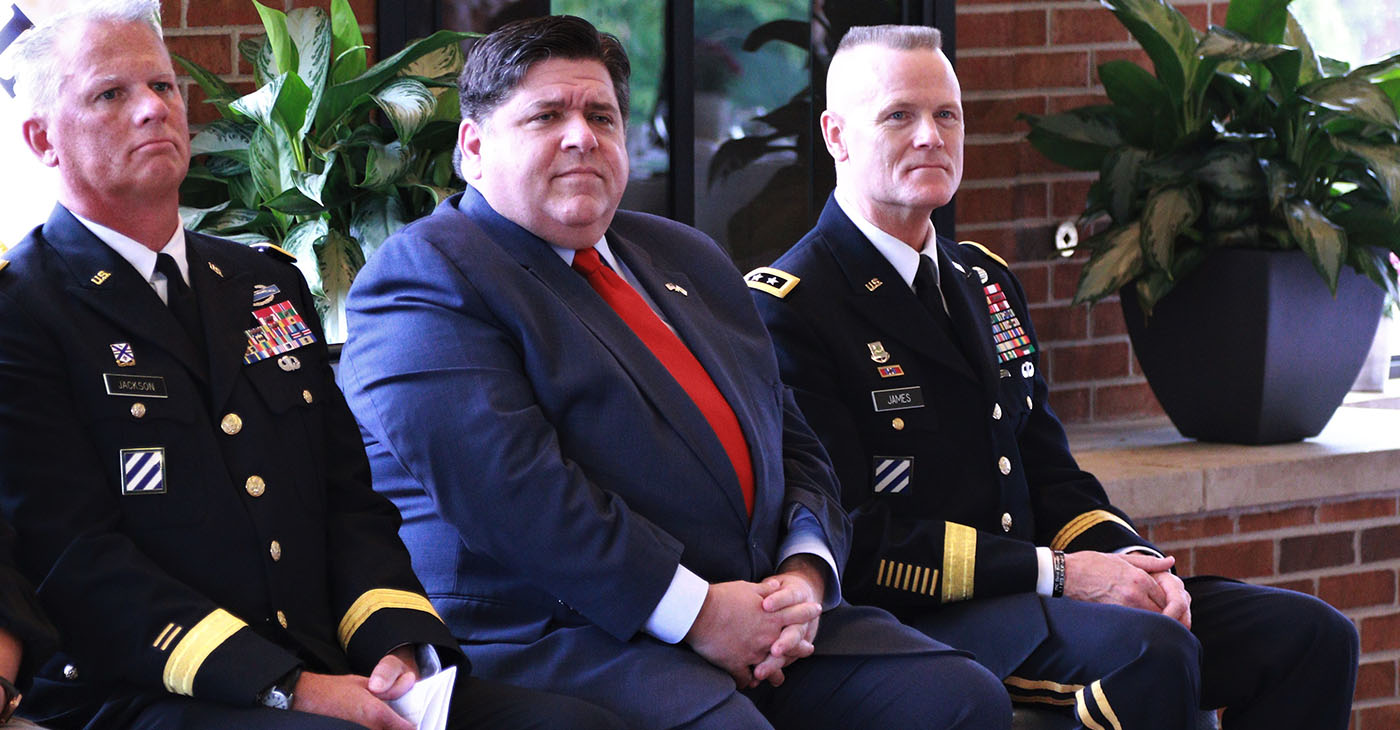 Illinois Governor JB Pritzker, First Army Commander Lt. Gen. Thomas S. James and Illinois National Guard Deputy Assistant Adjutant General - Army Brig. Gen. Mark Jackson listen to Illinois Department of Veteran Affairs Acting Director Linda Chapa LaVia speak during the Gold Star Mothers Luncheon The Illinois Department of Veteran Affairs Gold Star Mothers Luncheon gives senior civilian and military leaders a chance to thank Gold Star mothers for their service to our nation and its military. Governor JB Pritzker thanked the Gold Star Mothers and said he was humbled to have the opportunity to speak with them. In addition to the sacrifice their sons and daughters gave to their nation, many Gold Star mothers keep their Fallen Heroes memories alive and continue their service to the community and to the military, said Lt. Gen. Thomas S. James, the Commander of First Army and keynote speaker at the luncheon. The luncheon was held at the First Infantry Division Museum at Cantigny in Wheaton, Illinois, on Sunday, Sept. 29. (Photo: Lt. Col. Bradford Leighton / Wikimedia Commons)