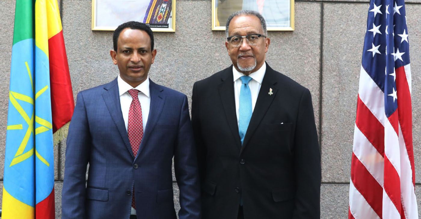 Fitsum Arega, Ethiopia’s Ambassador to the United States (left) and National Newspaper Publishers Association president and CEO Dr. Benjamin F. Chavis Jr.