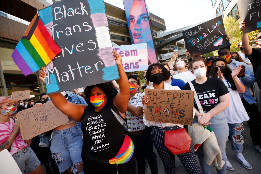 Netflix employees, activists, public figures and supporters gathered outside a Netflix location at 1341 Vine St in Hollywood Wednesday morning in support as members of the Netflix employee resource group Trans*, coworkers and other allies staged a walkout