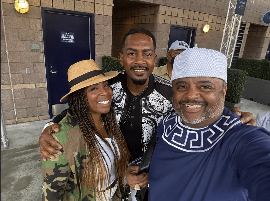 Journalist and political commentator Jasmyne Cannick with the co-hosts of the 4th annual Dymally International Jazz & Arts Festival comedian Bill Bellamy and Black Star Network owner Roland Martin.