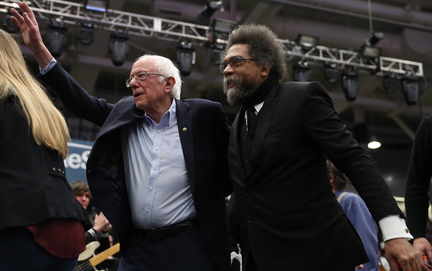 Bernie Sanders and Cornel West walk onstage together during a campaign event at the Whittemore Center Arena in Durham, New Hampshire, February 10, 2020. (Joe Raedle/Getty Images via JTA)