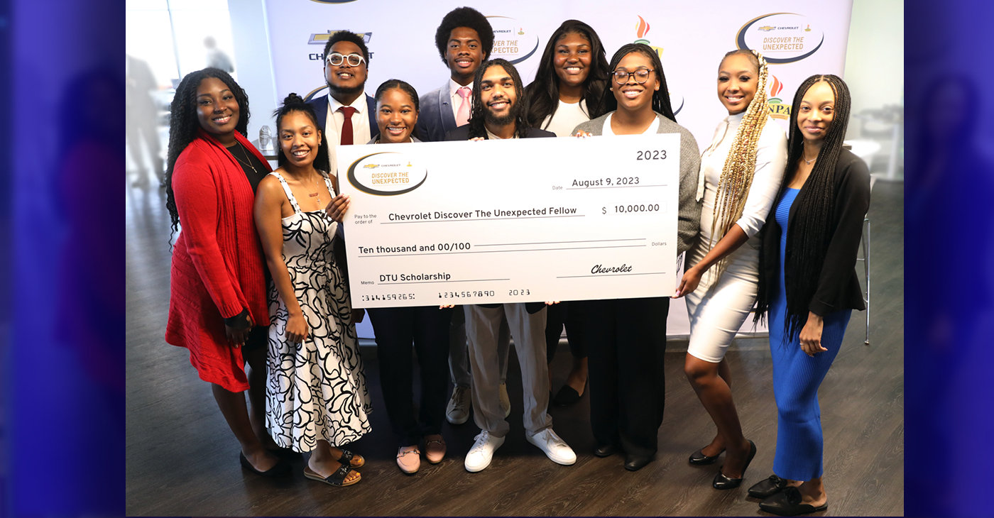 2023 Chevy DTU Fellows at the program closing ceremonies stand with their check.