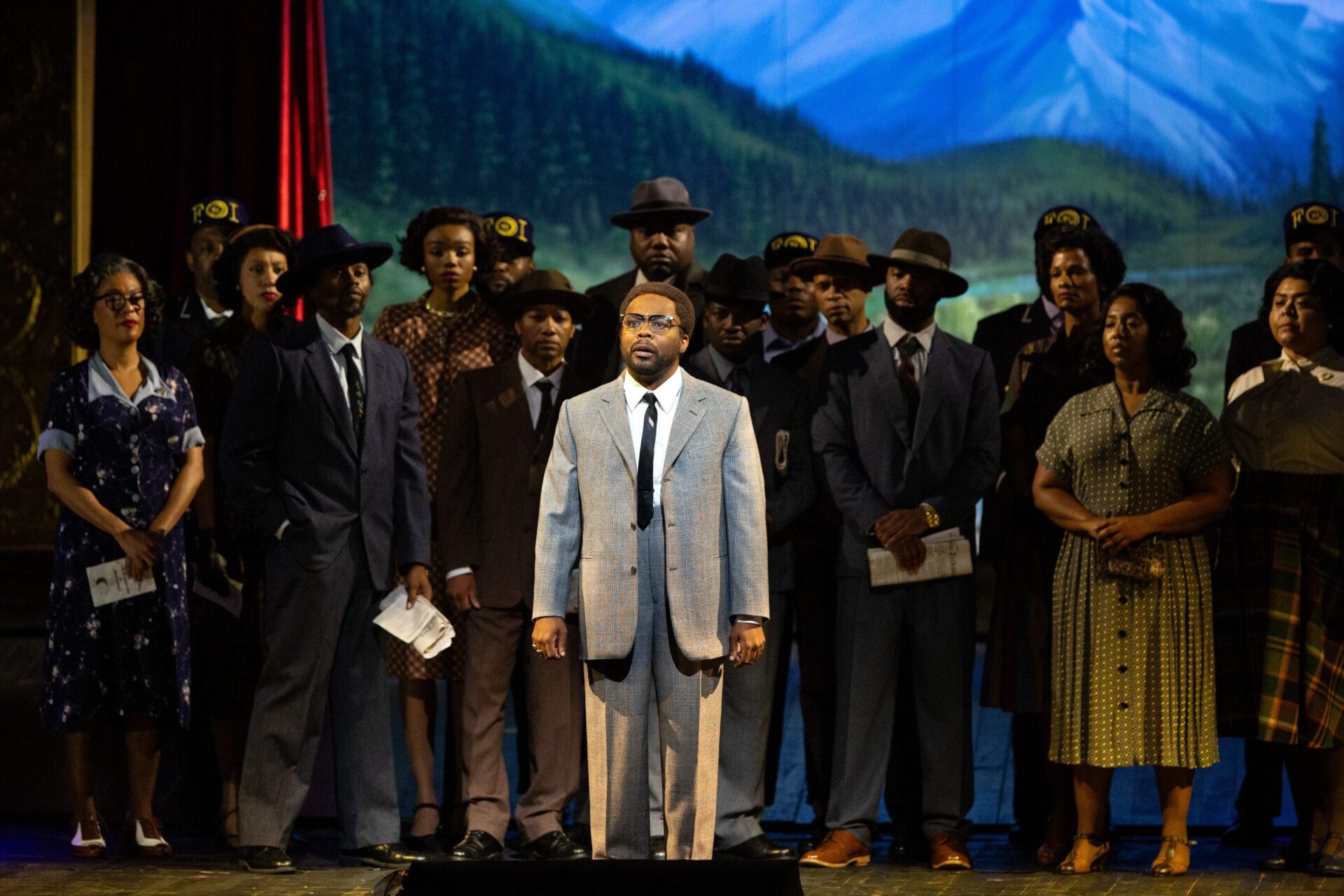 <strong>Reimagining Malcolm X Through Opera</strong>” width=”400″ height=”266″ />Scenes from X: The Life and Times of Malcolm X </p>
<p>“It’s significant,” says O’Hara as he reflects on the meaning of bringing X’s story to the Metropolitan Opera stage. “But you also have to acknowledge the fact that something hasn’t been going great in this situation. No one gets a hero cookie for doing this, right? It should have been done much sooner. I should not be the second, I should be the 200th Black director,” O’Hara says. </p>
<p>While the institution, itself, does not deserve a congratulatory nod, the people, voices, and visionaries behind the X opera, certainly do.  </p>
<p>X: The Life and Times of Malcolm X is absolutely stunning. The three-hour opera is a gorgeous homage to the life of X, and a continuation of his legacy. The opera starts and ends at the <a href=