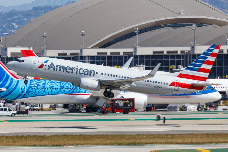 Three Black Men Sue American Airlines (logo) - Depositphotos