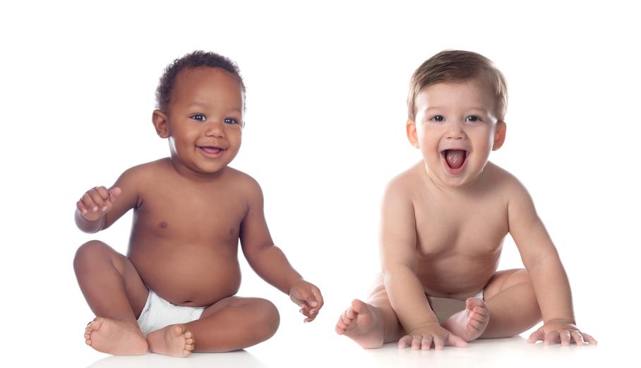 Black and White infants (in diapers) - Depositphotos