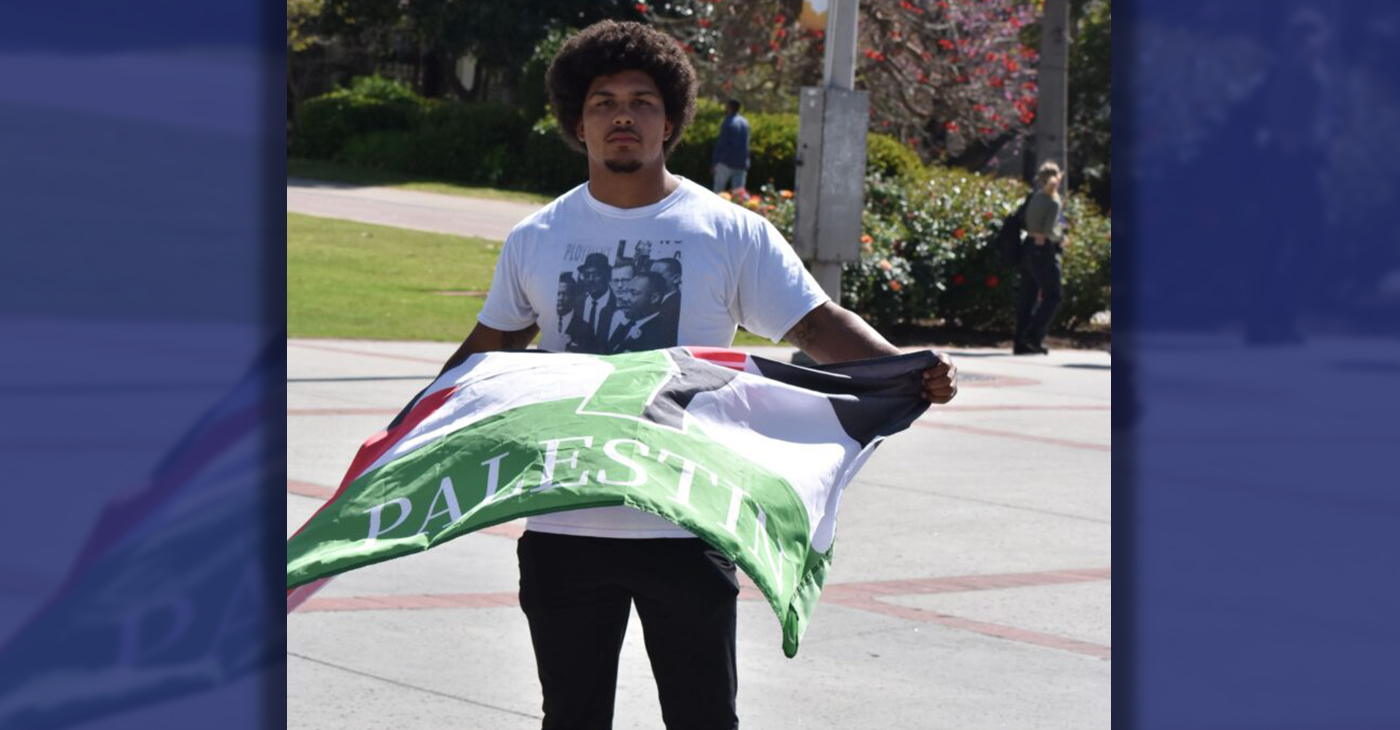 Mateo Olmos outside Hepner Hall at SDSU Tuesday, April 30, 2024. PHOTO: Macy Meinhardt/ Voice & Viewpoint.