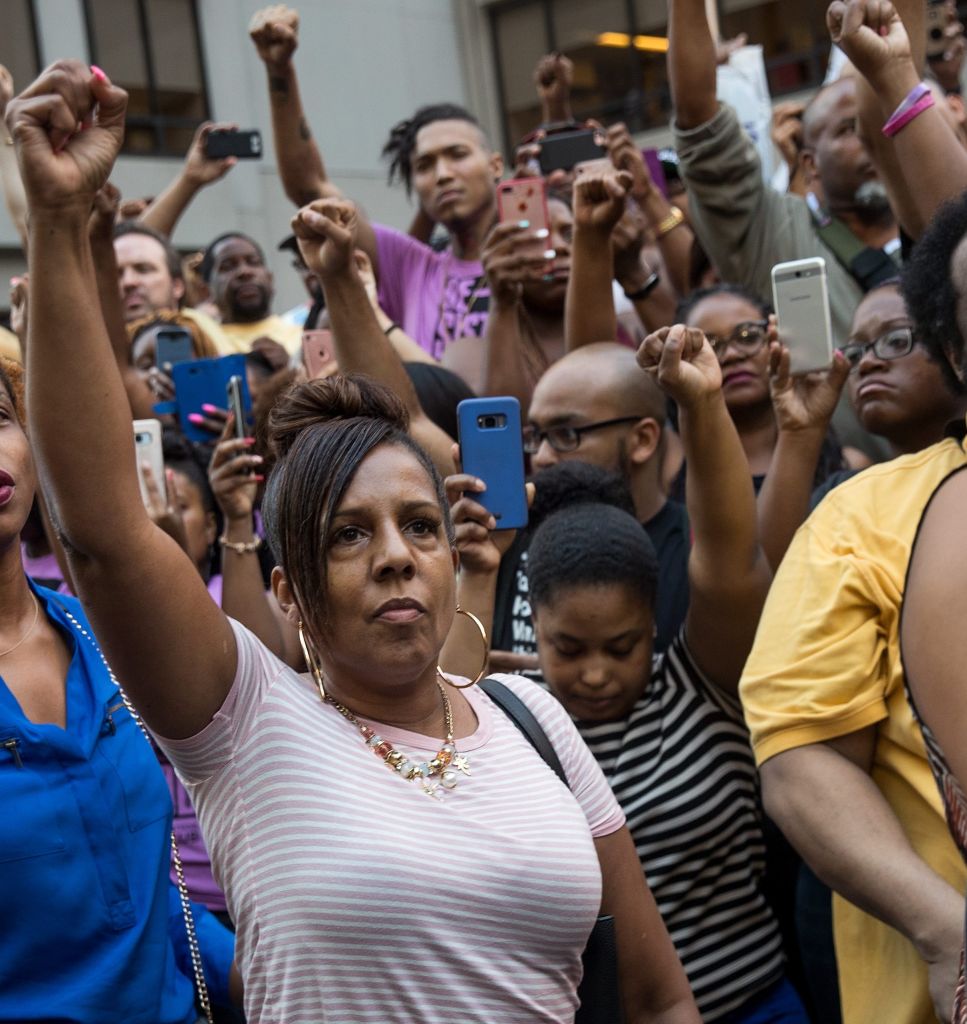 Rally In Support Of NFL Quarterback Colin Kaepernick Outside The League's HQ In New York