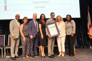 Davis (left) met with education leaders and supporters who helped students complete their Child Development Associate (CDA) Credential coursework through the Professional Development Institute at the Early Learning Coalition of Miami-Dade/Monroe.