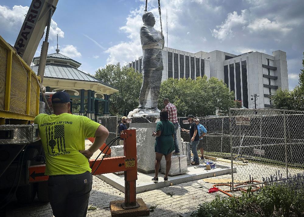 John Lewis statue replaces century-old Confederate monument. // (Ron Harris-AP via CNN Newsource) 