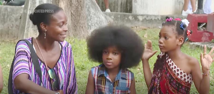 Afro hairstyles revive in Cuba, embracing African heritage anew // Cuba Afro-hair styles - screenshot