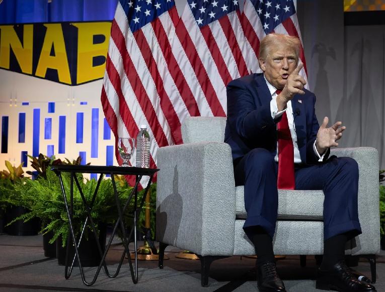 Trump vows prison for election officials if 2024 cheating occurs // Trump at NABJ - via screenshot