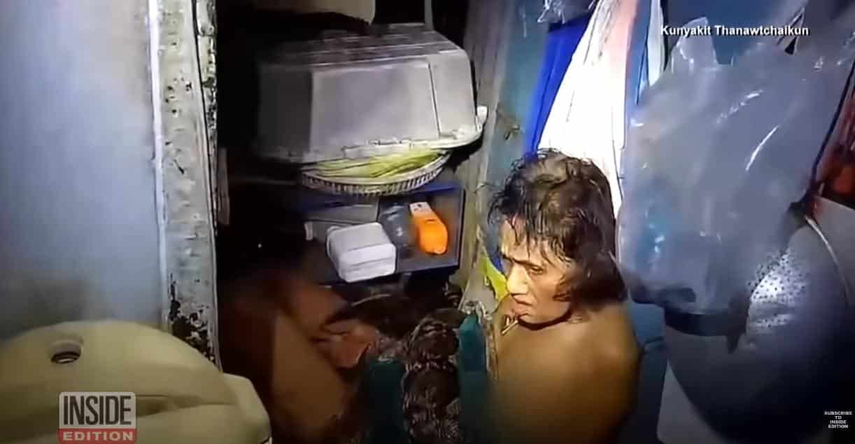 Police saved a Thai woman after a two-hour python attack // Woman trapped by Python - screenshot