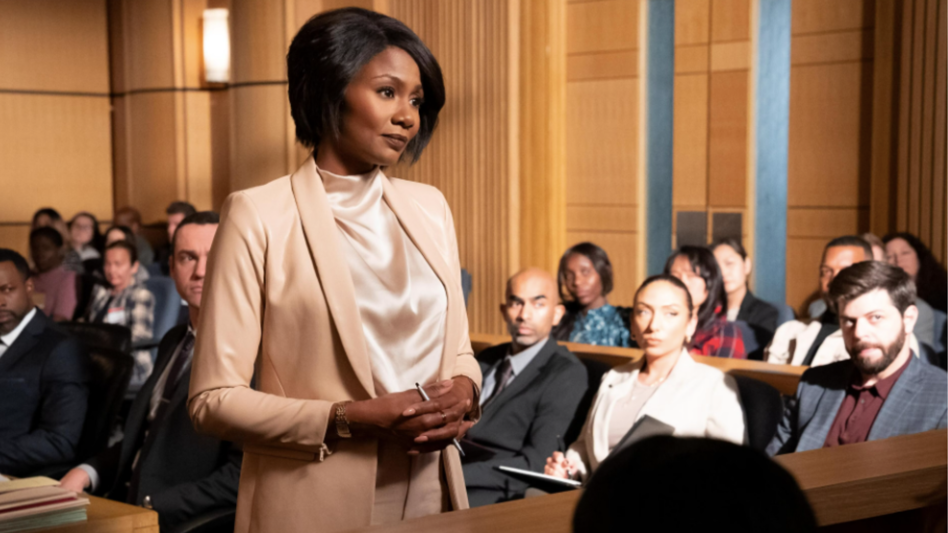 Emayatzy Corinealdi’s Costumes In ‘Reasonable Doubt’ Showcase Powerful Workwear