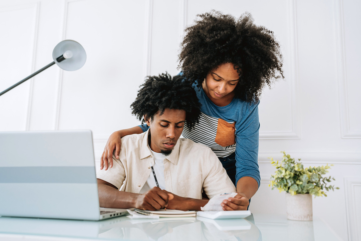 Couple paying bills personal finances