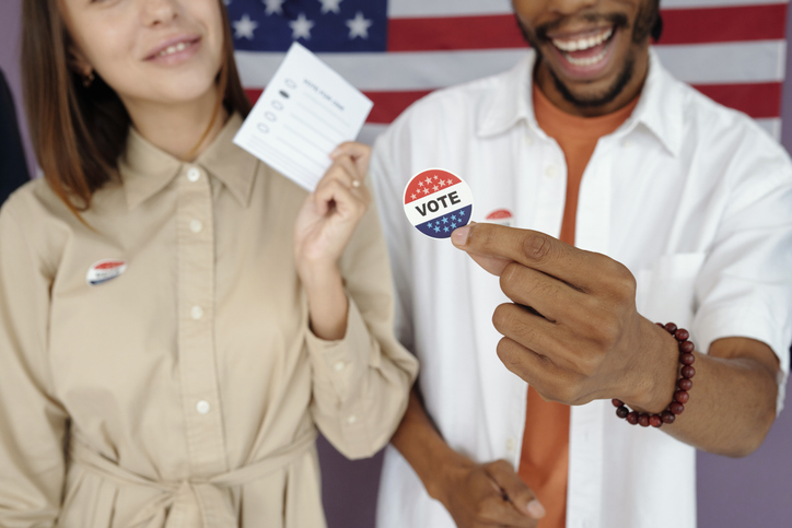 Young People Voting At Election Day